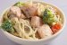 Лапша пшеничная с кусочками лосося, овощами в сливочном соусе / Wheat noodles with slices of salmon and vegetables in cream sauce